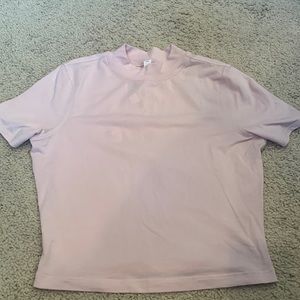 Really pretty blush crop top a Lululemon Size 4
